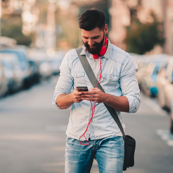 man-walking-on-phone digital marketing solutions